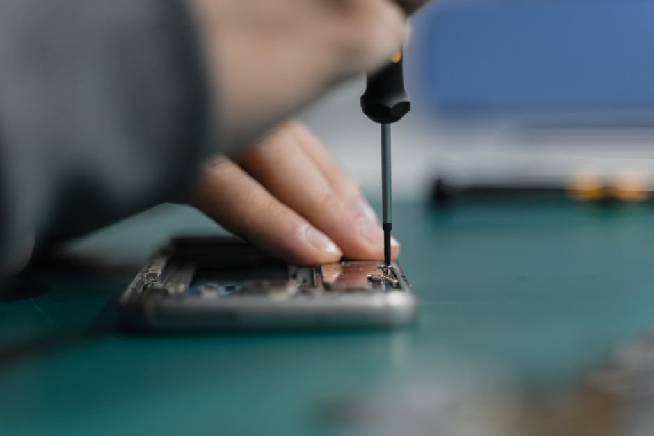 Technician repairing a device